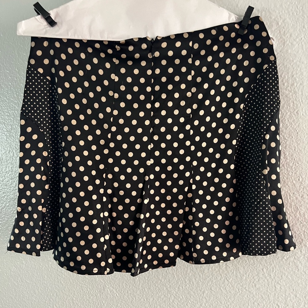 Polka dot mini skirt size small Bebe brand